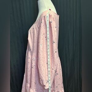Plus size, long sleeve, pink dress with stars.